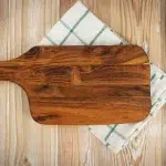 Walnut Artisan Board by MLB Woodworking, rich dark tones with a luxurious grain pattern, ideal for serving charcuterie or as a kitchen centerpiece.
